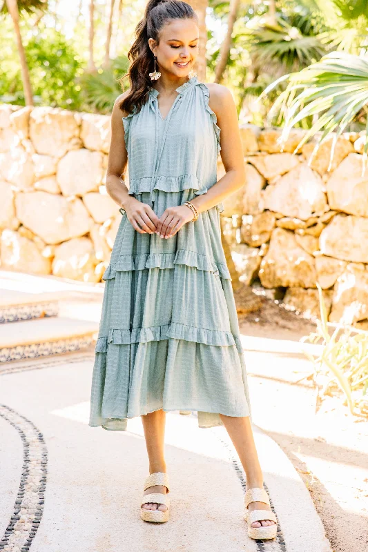 Midi dresses with ruched bodices for a feminine and fitted feel Pursue Perfection Sage Green Ruffled Midi Dress Midi dresses with ruched bodices for a feminine and fitted feel Pursue Perfection Sage Green Ruffled Midi Dress
