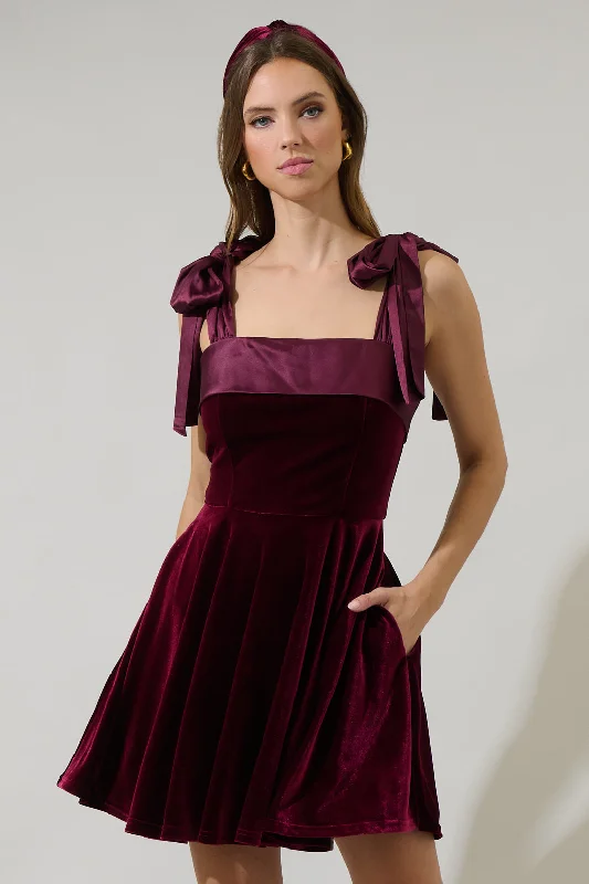 Leather mini dresses for a edgy style Adison Bow Velvet Mini Dress