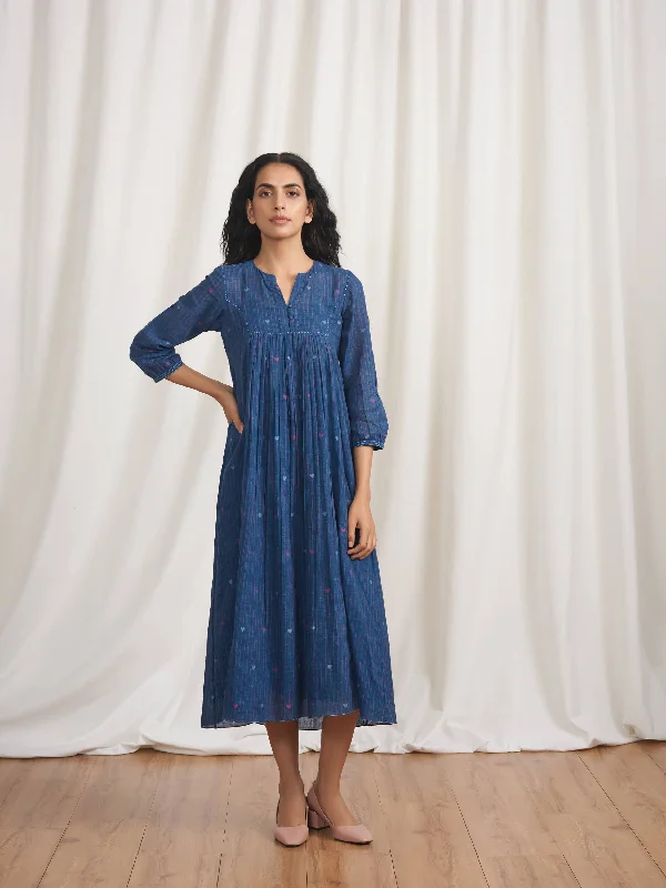 Midi dresses with tassel accents for a bohemian and free - spirited style Indigo Skies Gathered Dress Midi dresses with tassel accents for a bohemian and free - spirited style Indigo Skies Gathered Dress
