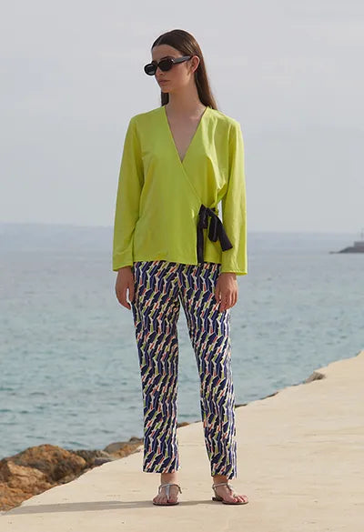 Women's faux fur coats in bright colors for a bold fashion statementScorzzo Wrap top with navy side tie 0124654 Women's faux fur coats in bright colors for a bold fashion statementScorzzo Wrap top with navy side tie 0124654