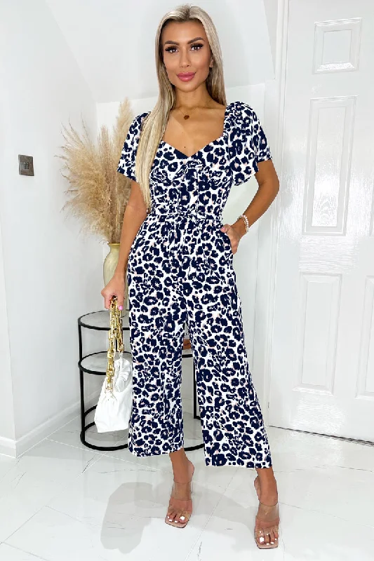 Women jumpsuits with fringe accents for a bohemian and fun - loving styleCream Pink And Navy Animal Print Short Sleeve Tie Front Jumpsuit Women jumpsuits with fringe accents for a bohemian and fun - loving styleCream Pink And Navy Animal Print Short Sleeve Tie Front Jumpsuit