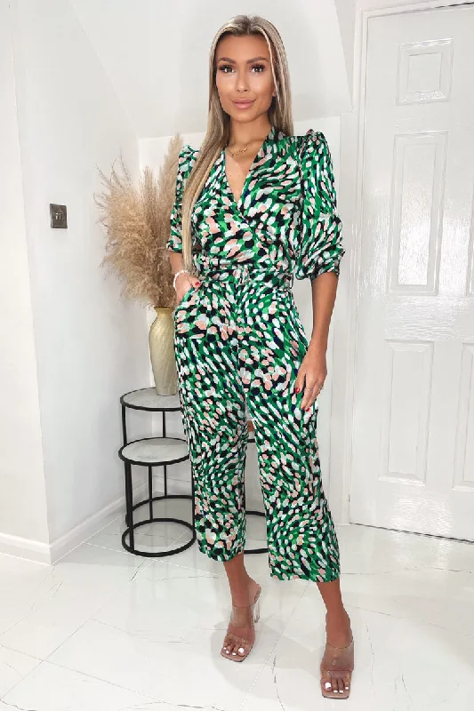 Women jumpsuits with pocket details for added functionality and convenienceGreen and Pink Printed V Neck Belted Jumpsuit