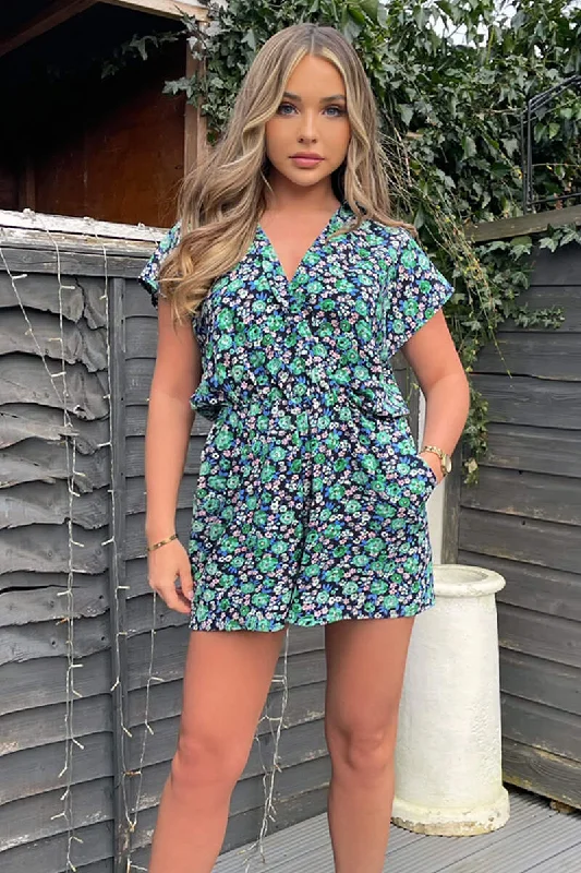 Women jumpsuits with spaghetti - strap tops for a delicate and breezy lookNavy And Green Floral Printed Playsuit Women jumpsuits with spaghetti - strap tops for a delicate and breezy lookNavy And Green Floral Printed Playsuit