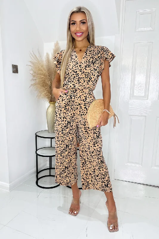 Linen women jumpsuits for a breathable and relaxed summer lookPeach And Black Printed V Neck Frill Sleeve Jumpsuit Linen women jumpsuits for a breathable and relaxed summer lookPeach And Black Printed V Neck Frill Sleeve Jumpsuit
