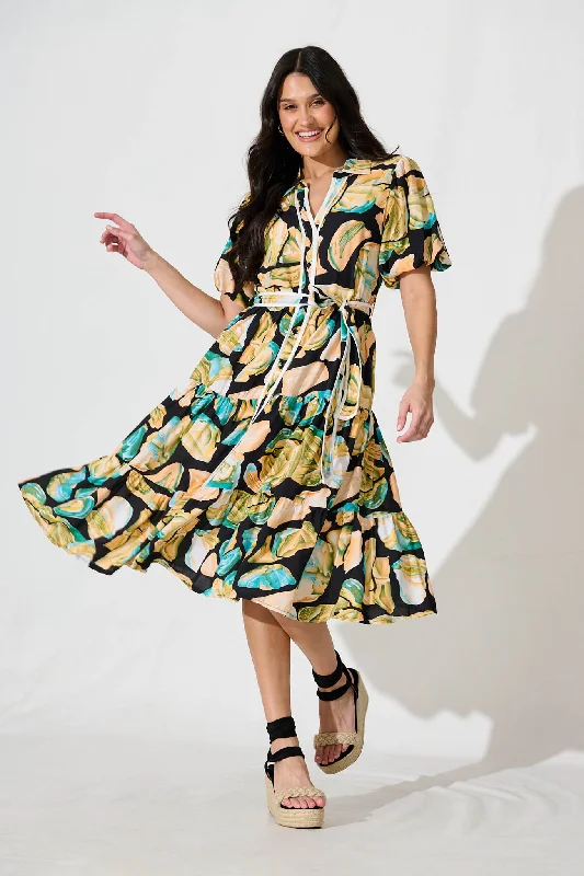Midi dresses with tiered skirts for a bohemian festival lookAoife Shirt Dress in Black Multi Midi dresses with tiered skirts for a bohemian festival lookAoife Shirt Dress in Black Multi