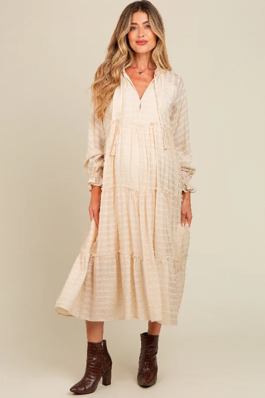 Maxi - inspired midi dresses with flowing fabrics for a beachy vibeCream Striped Front Tassel Tie Tiered Maternity Midi Dress Maxi - inspired midi dresses with flowing fabrics for a beachy vibeCream Striped Front Tassel Tie Tiered Maternity Midi Dress