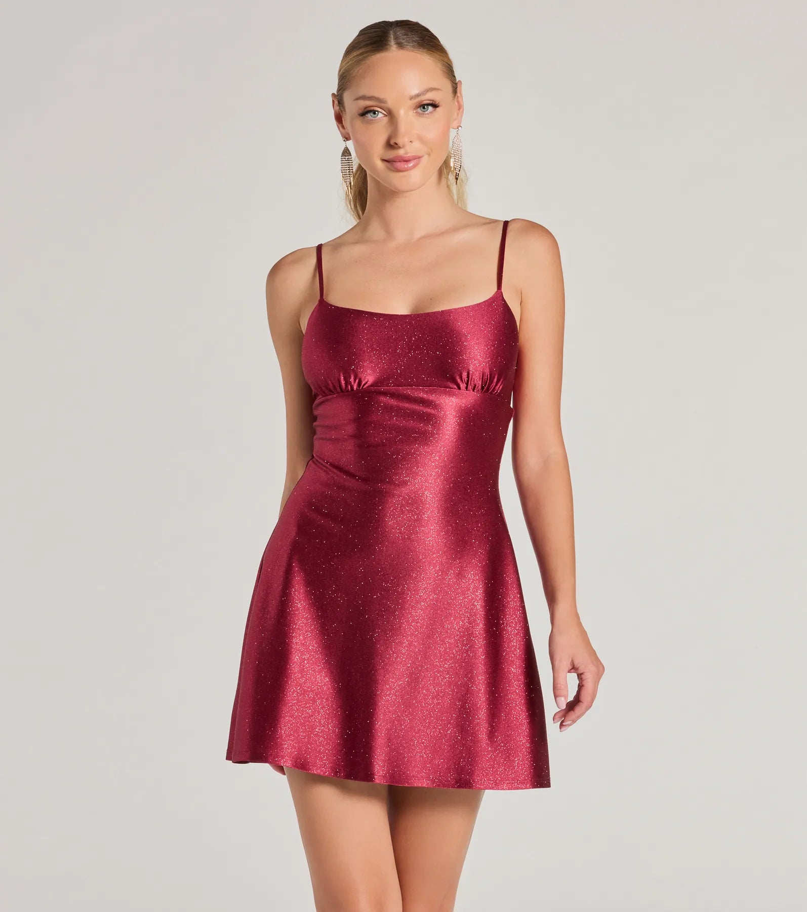 Mini dresses with fringe for a bohemian styleGlistening Beauty Glitter Satin Mini Dress Mini dresses with fringe for a bohemian styleGlistening Beauty Glitter Satin Mini Dress