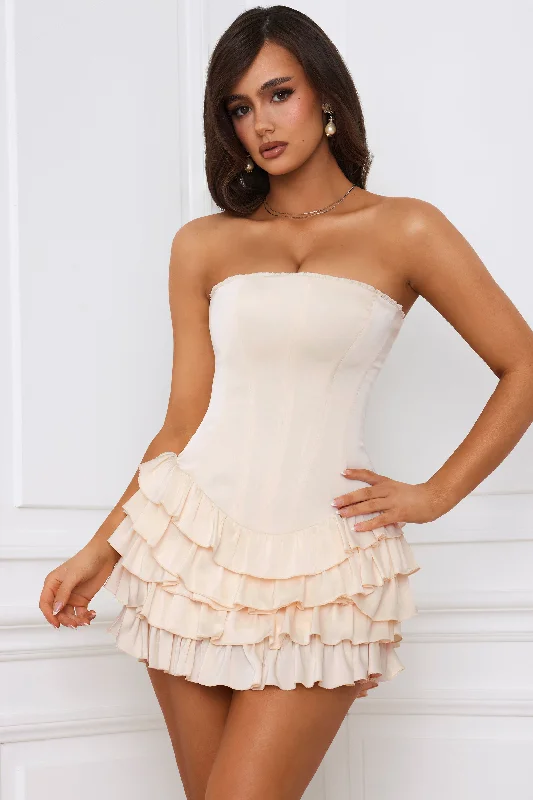 Strapless mini dresses for a beach vacationBandeau Ruffled Tiered Corset Mini Dress in Ivory Strapless mini dresses for a beach vacationBandeau Ruffled Tiered Corset Mini Dress in Ivory