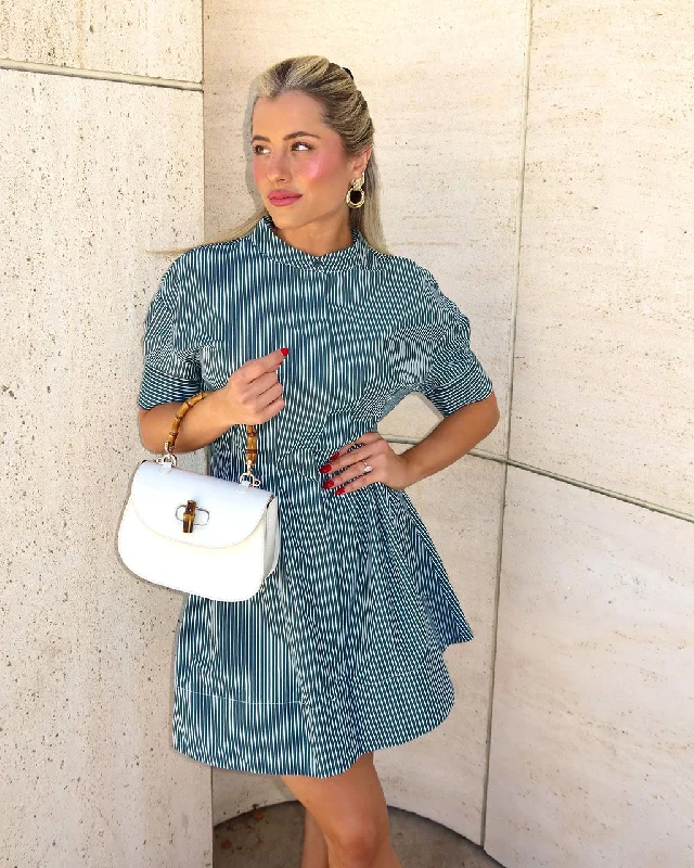 Mini dresses with ruched bodices for a feminine touchKya Fit and Flare Mini Shirt Dress Mini dresses with ruched bodices for a feminine touchKya Fit and Flare Mini Shirt Dress