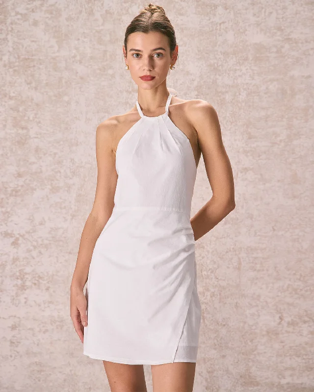 Mini dresses with embroidered details for a unique touchThe White Ruched Halter Mini Dress Mini dresses with embroidered details for a unique touchThe White Ruched Halter Mini Dress