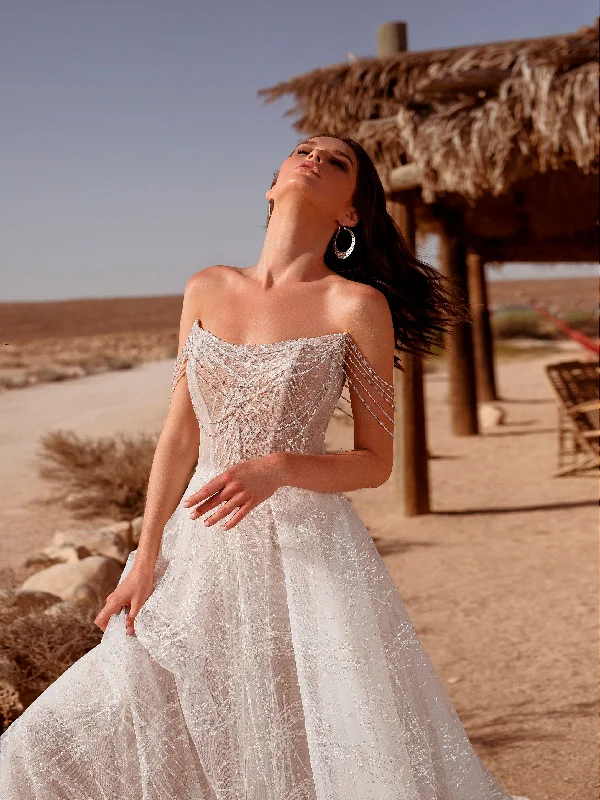 Wedding dresses with a belt made of crystalsGlitter Wedding Gown with Delicate Beaded Straps Wedding dresses with a belt made of crystalsGlitter Wedding Gown with Delicate Beaded Straps