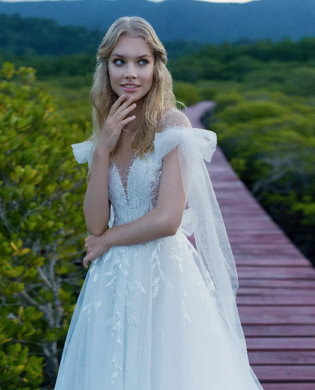 Lace - covered wedding dresses with a scalloped hemIllusion Neck A-Line Wedding Dress Lace - covered wedding dresses with a scalloped hemIllusion Neck A-Line Wedding Dress