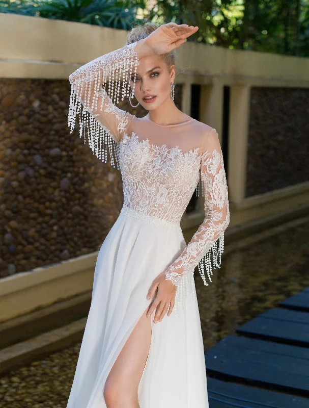 Boho - inspired wedding dresses with floral embroideryLong Sleeve Bohemian Wedding Dress Boho - inspired wedding dresses with floral embroideryLong Sleeve Bohemian Wedding Dress