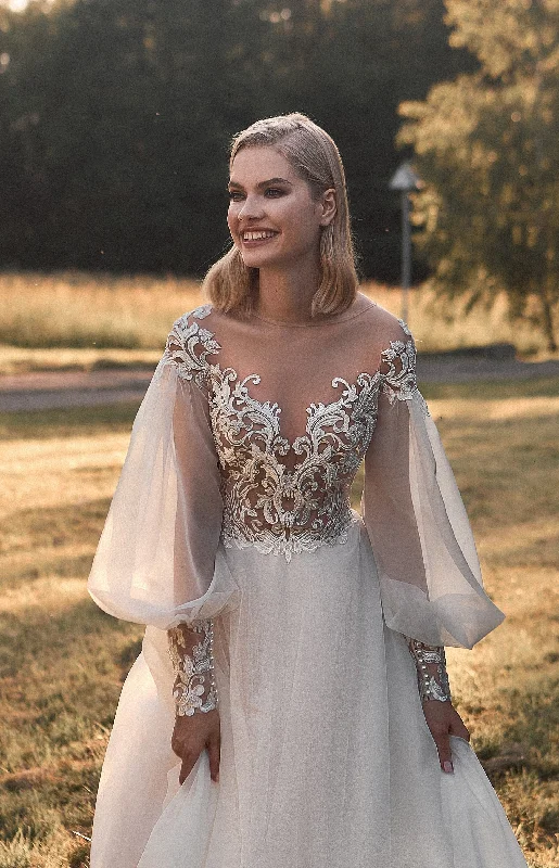 Wedding dresses with a bateau neckline for a classic shapePuffy Sleeves Illusion Neck A-Line Wedding Dress Wedding dresses with a bateau neckline for a classic shapePuffy Sleeves Illusion Neck A-Line Wedding Dress