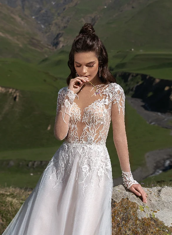 Wedding dresses with a mermaid - style skirt and a ball gown overlaySheer Long Sleeve A-Line Wedding Dress Wedding dresses with a mermaid - style skirt and a ball gown overlaySheer Long Sleeve A-Line Wedding Dress