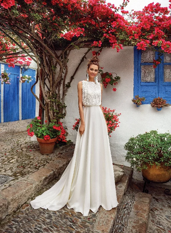 Wedding dresses with a mermaid - style skirt and a ball gown overlaySleeveless A-Line Feminine Unique Wedding Dress Wedding dresses with a mermaid - style skirt and a ball gown overlaySleeveless A-Line Feminine Unique Wedding Dress