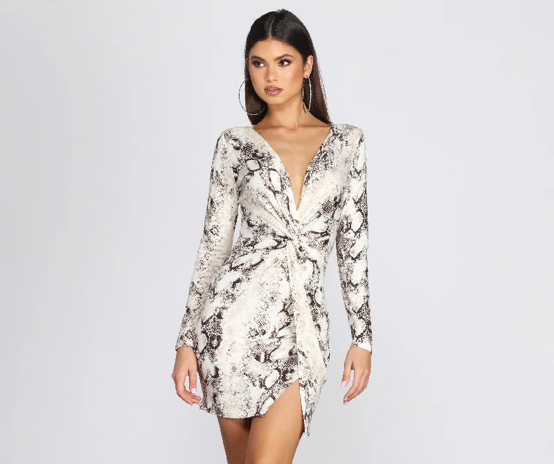 Bodycon dress with a transparent panel​Viper Vixen Knot Mini Dress