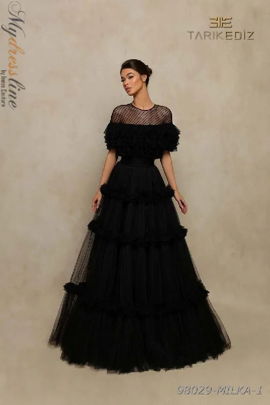 Prom dresses with metallic - colored fabrics and beaded embroidery for a glamorous promTarik Ediz 98029 Prom dresses with metallic - colored fabrics and beaded embroidery for a glamorous promTarik Ediz 98029