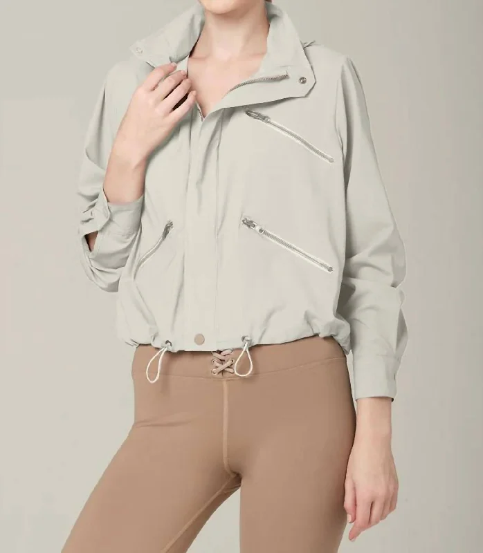 Embroidered women's cotton coats in a bohemian pattern for a unique designZip Locked Waterproof Lightweight Jacket In Ash Grey Embroidered women's cotton coats in a bohemian pattern for a unique designZip Locked Waterproof Lightweight Jacket In Ash Grey
