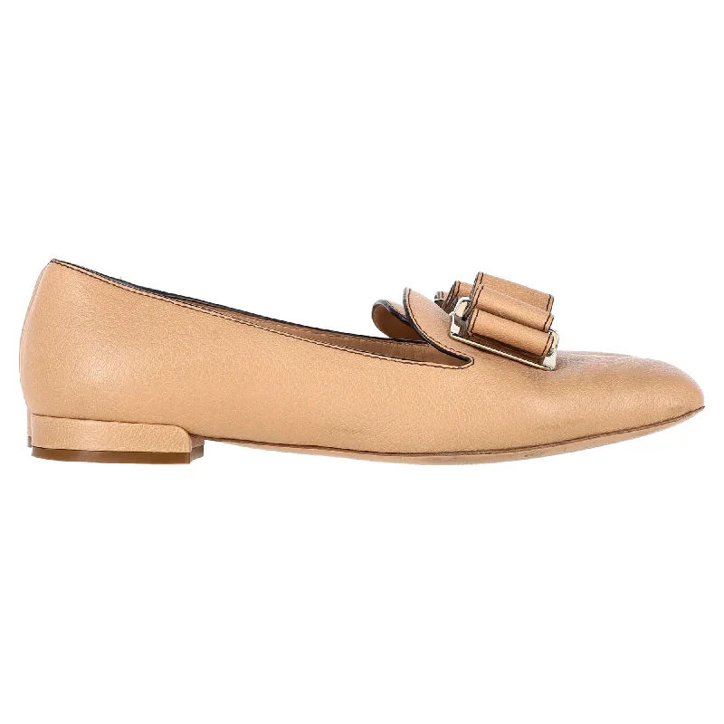 Women's Ankle Strap Mules in Navy Blue with Rhinestone Embellishments for a Sparkly LookFerragamo Double-Bow Loafers in Nude Leather