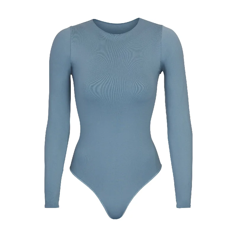 Seamless Bodysuits for a Smooth Underwear LookESSENTIAL CREW NECK LONG SLEEVE BODYSUIT | ARCTIC Seamless Bodysuits for a Smooth Underwear LookESSENTIAL CREW NECK LONG SLEEVE BODYSUIT | ARCTIC