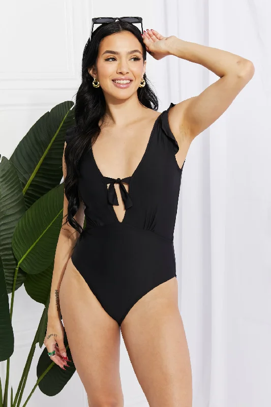 Women's Sheer Paneled One - Pieces in White for a Delicate and Elegant Evening AppearanceMarina West Swim Seashell Ruffle Sleeve One-Piece in Black Women's Sheer Paneled One - Pieces in White for a Delicate and Elegant Evening AppearanceMarina West Swim Seashell Ruffle Sleeve One-Piece in Black