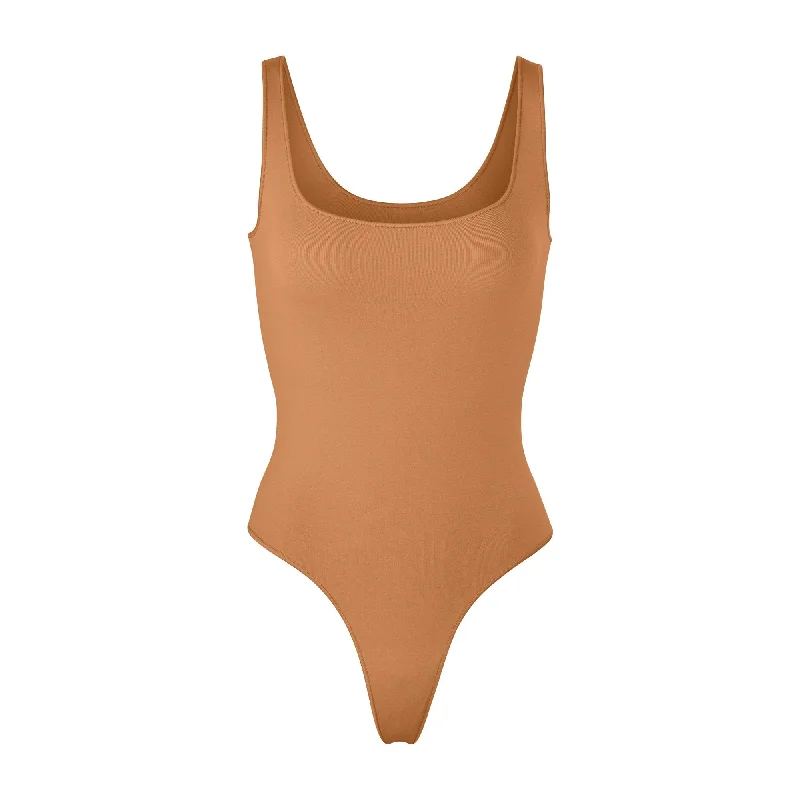 Mesh Bodysuits for a Bold and Edgy Fashion StatementESSENTIAL SCOOP NECK BODYSUIT | CAMEL Mesh Bodysuits for a Bold and Edgy Fashion StatementESSENTIAL SCOOP NECK BODYSUIT | CAMEL