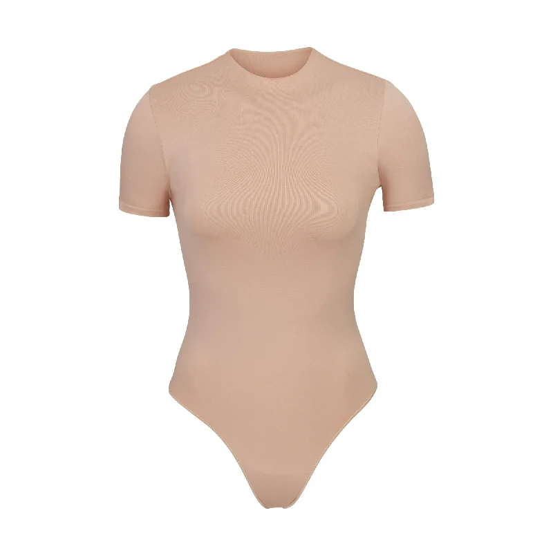 Sheer Bodysuits for a Seductive and Alluring OutfitESSENTIAL T-SHIRT BODYSUIT | SANDSTONE Sheer Bodysuits for a Seductive and Alluring OutfitESSENTIAL T-SHIRT BODYSUIT | SANDSTONE